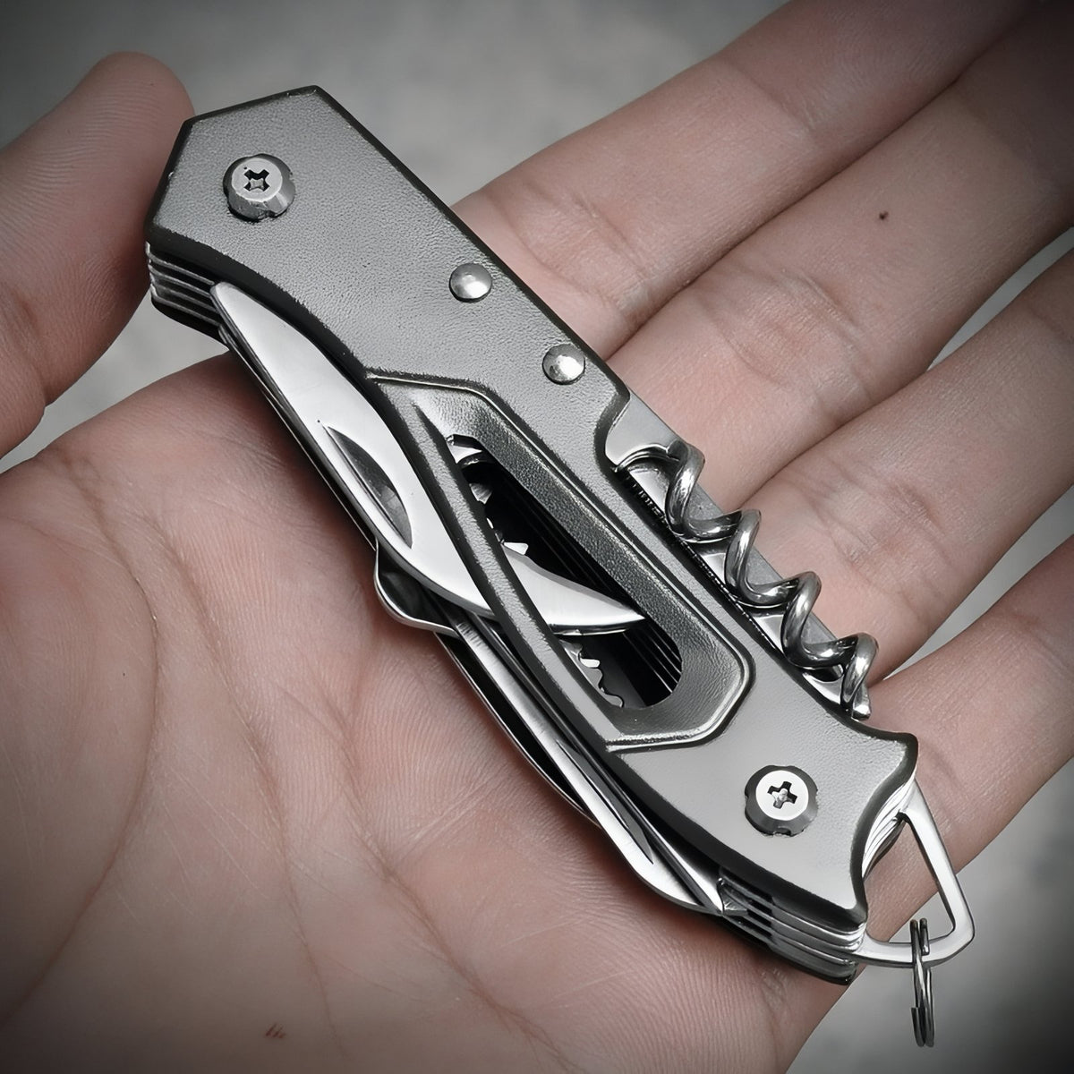 Multifunction Pocket Knife held in hand - Black