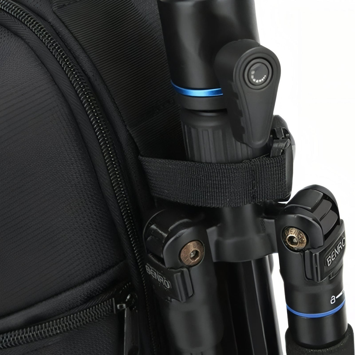 Close-up of Hiking Camera Bag with attached tripod - Orange - Gray - Red