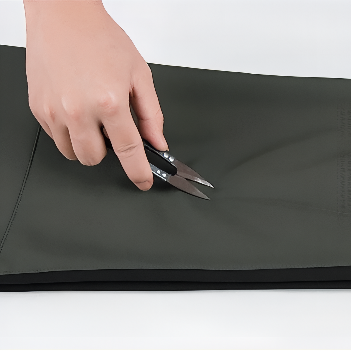 Men's Water-Repellent Hiking Pants close-up fabric - Dark Green and Black - Dark Gray and Orange - Black and Orange