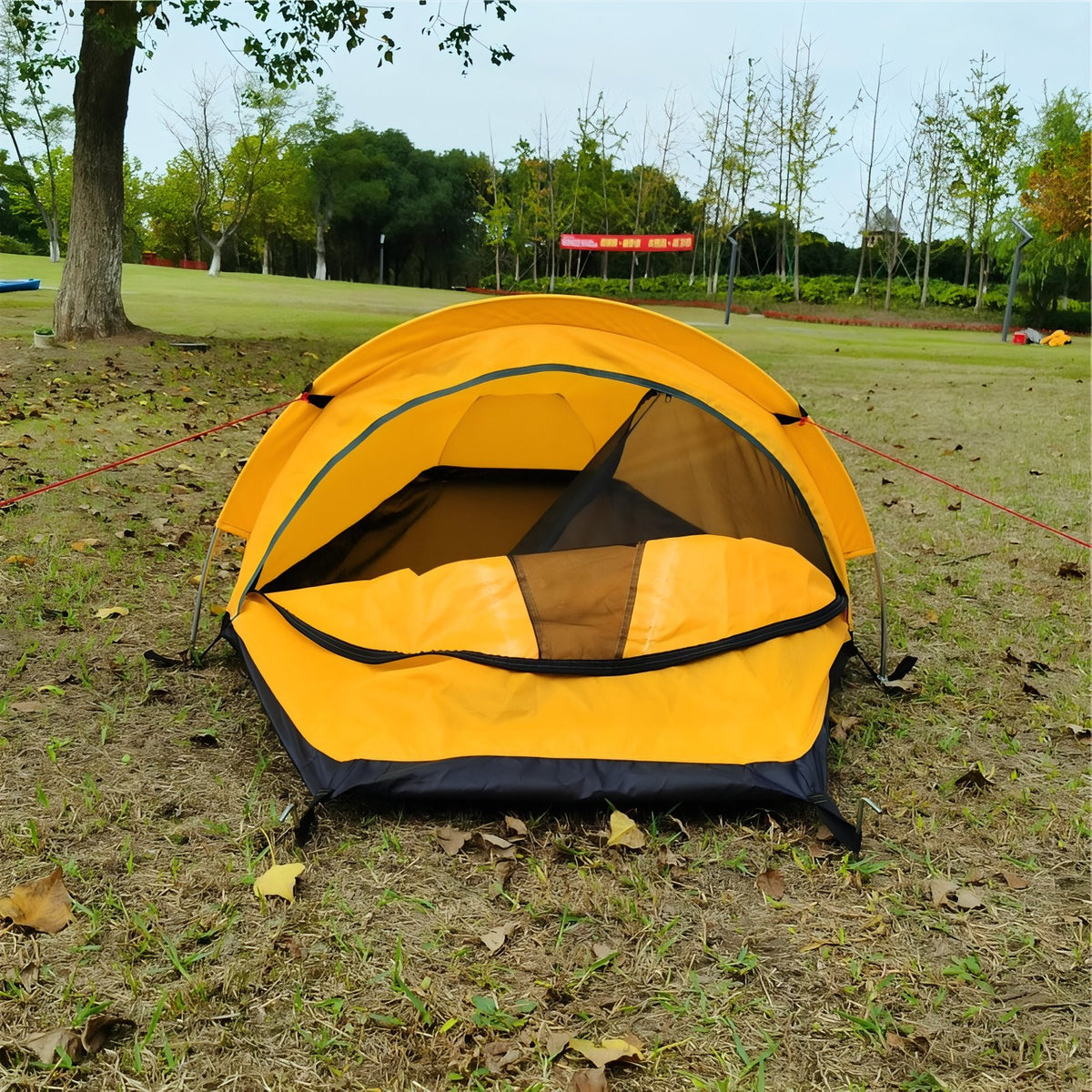 1-Person Hiking Tent in outdoor setting - Dark Green - Yellow and Black